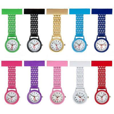 dottore infermiera con acciaio orologio infermiere spilla