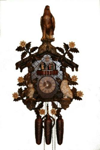 orologio a cucu in legno intaglio pregiato