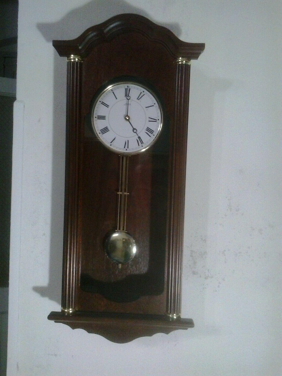 orologio a pendolo da parete in legno