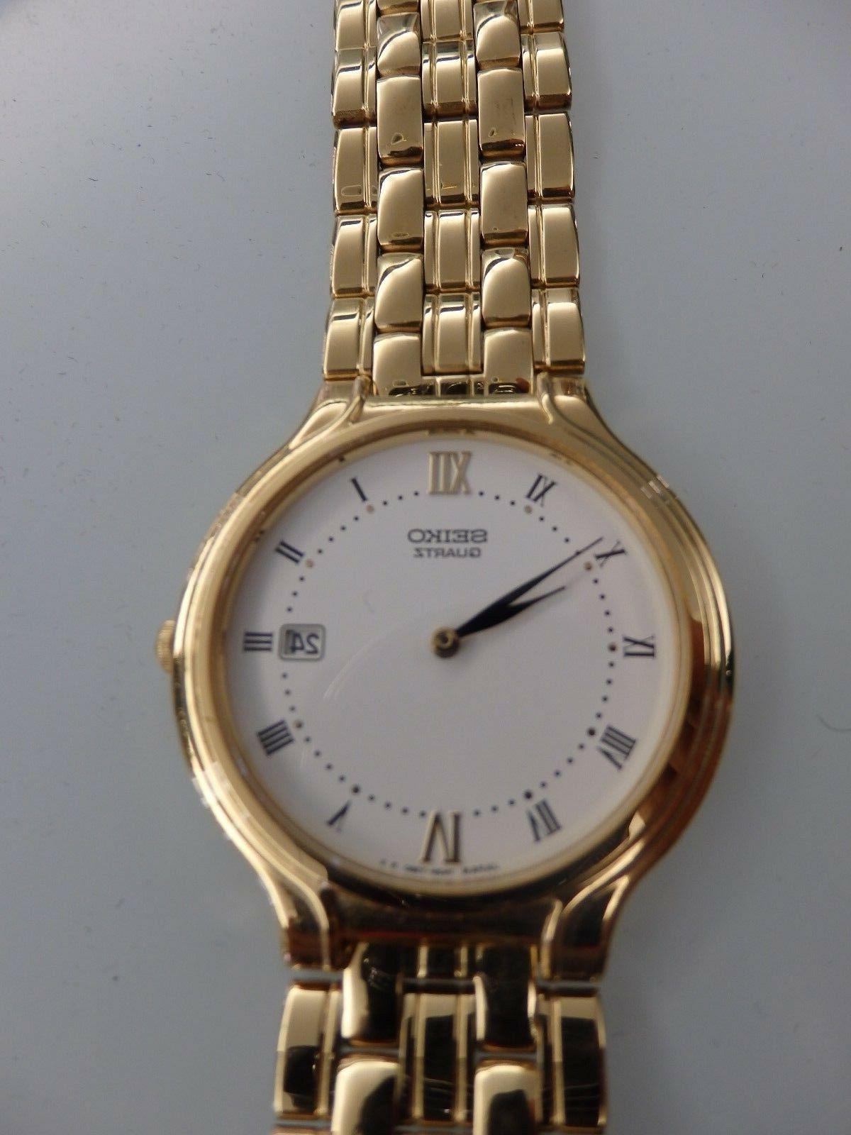 orologio braccialato dorato unisex