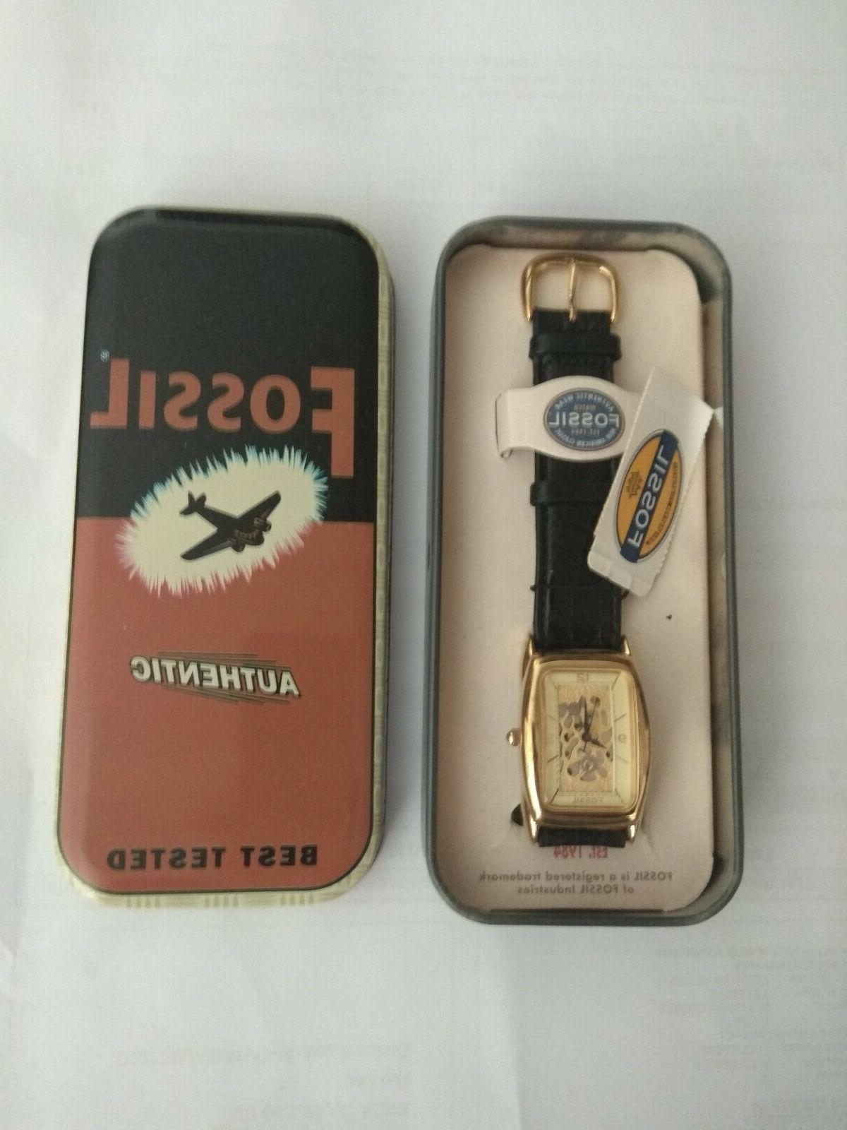 orologio acciaio oro cinturino di pelle nero