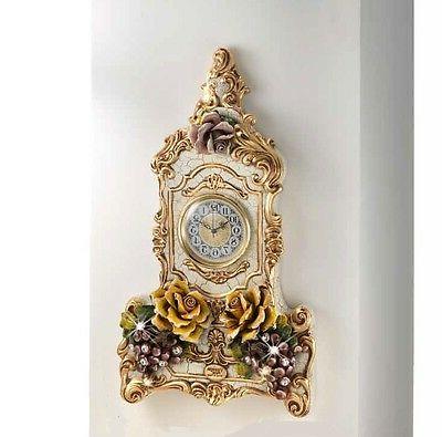 orologio da muro con rose e uva