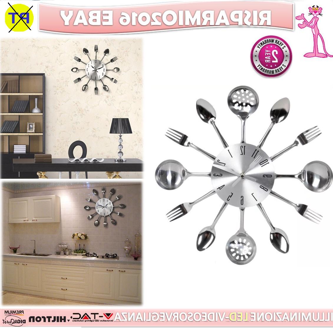 orologio da parete con posate decorazione cucina