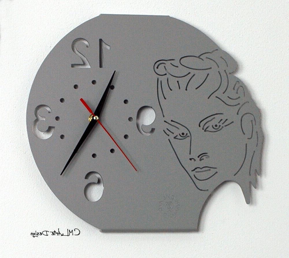 orologio da parete in acciaio modello schiena2