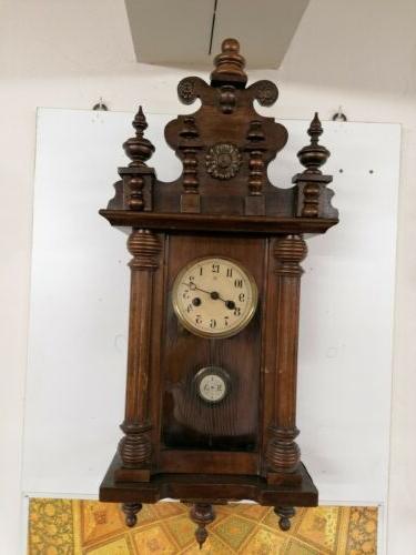 orologio da parete in legno a pendolo