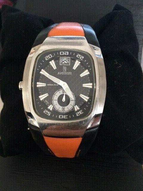 orologio quadrante rettangolare sfondo nero cinturino in