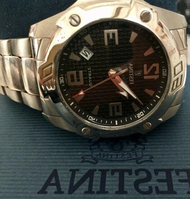 orologio uomo acciaio quadrante tondo sfondo nero