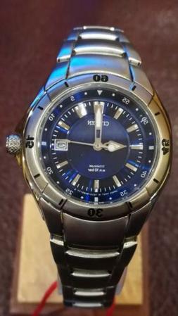 CITIZEN WR100 Titanium, con datario, indici e sfere luminesc